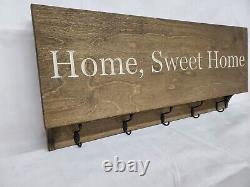 Entryway gun concealment storage safe coat rack rustic dark walnut home sweet