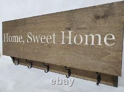 Entryway gun concealment storage safe coat rack rustic dark walnut home sweet