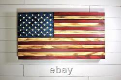 Wood American flag hidden gun storage with pegboard. 3 compartment concealment